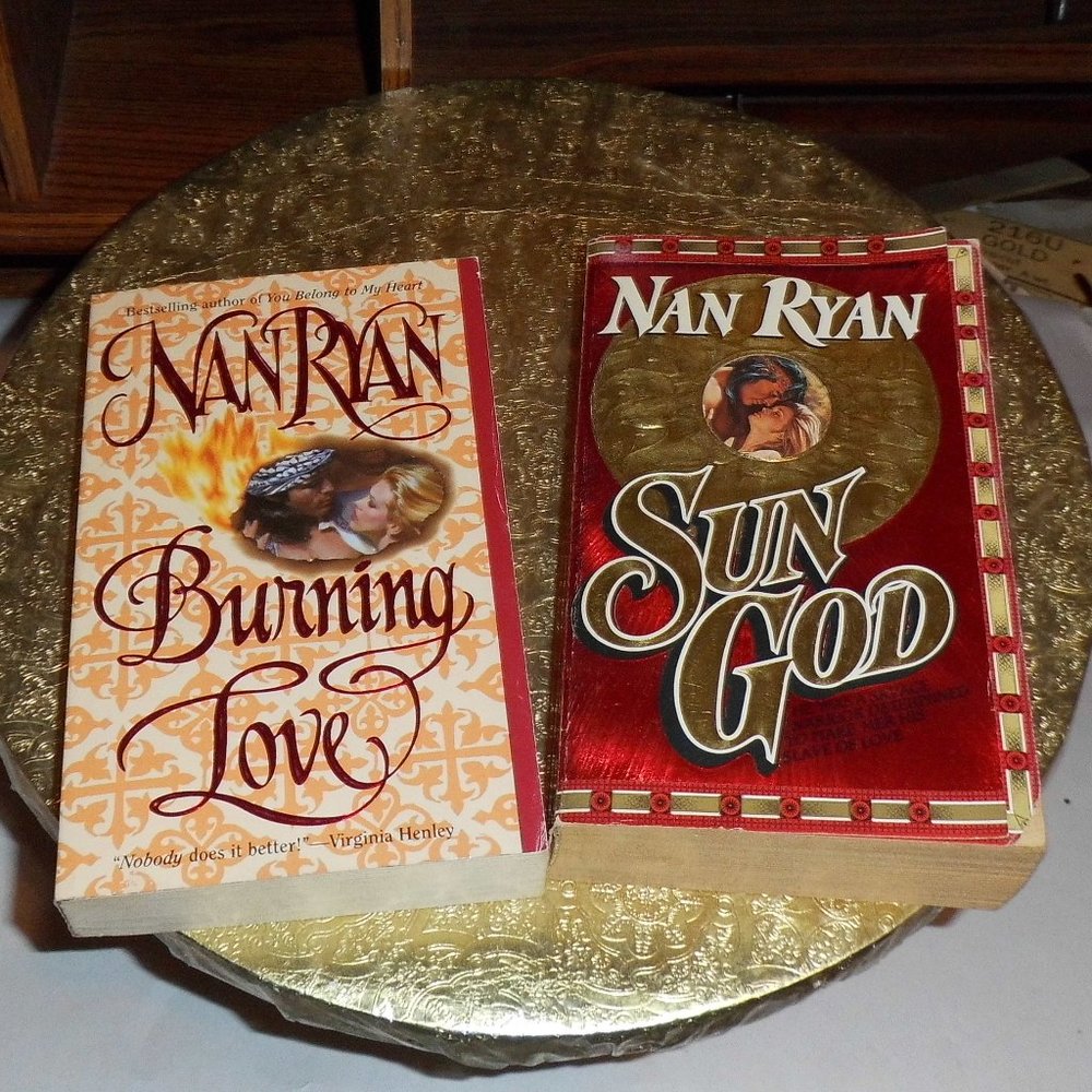 Books - (set/2) - "Burning Love"  &  "Sun God"